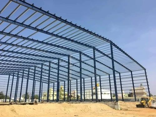 Large pre-engineered steel building structure at a project site